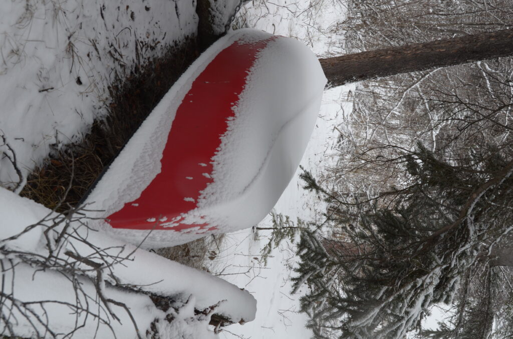 Red Canoe on the Way Down